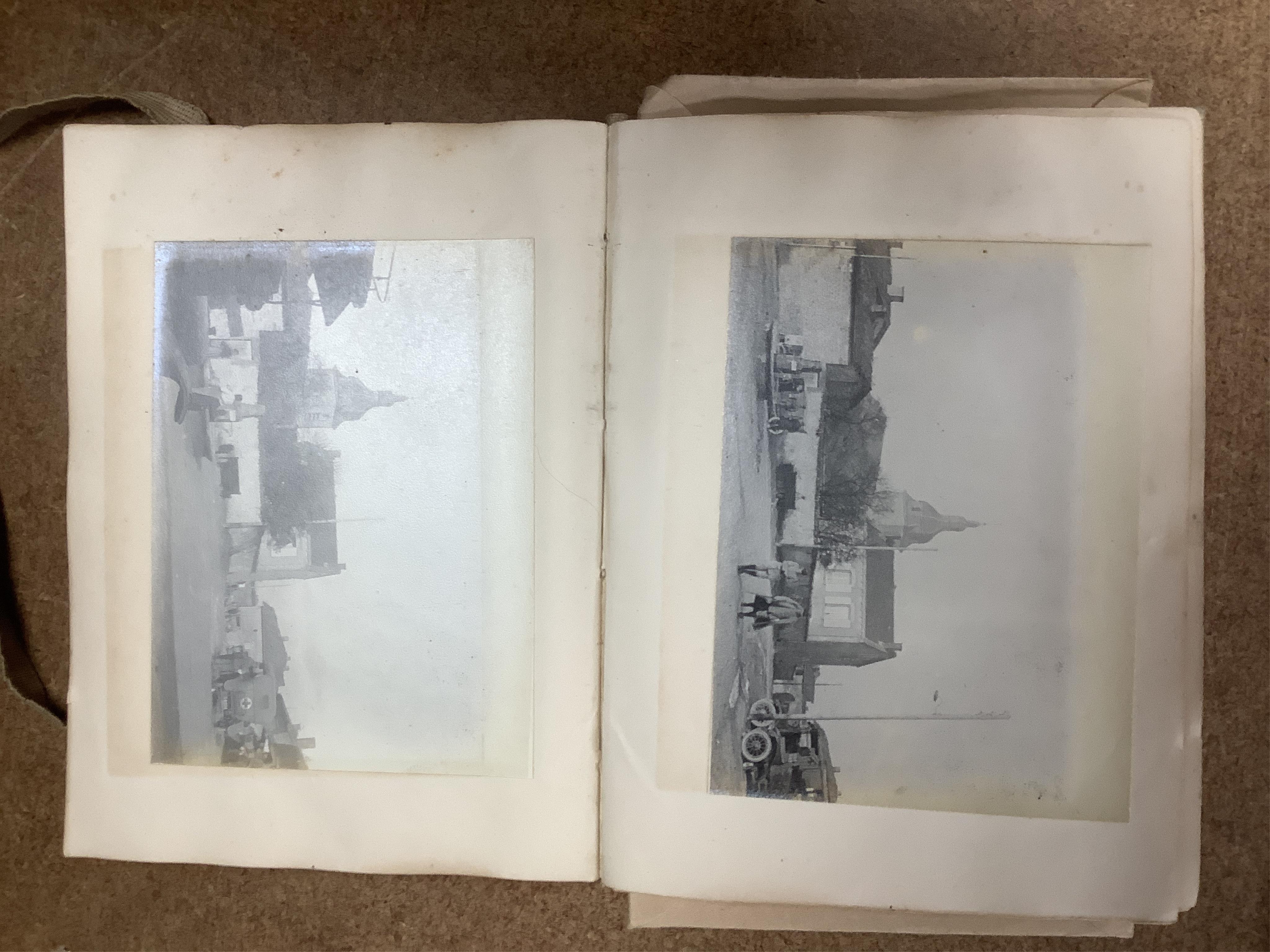 A WWI Ambulance and Balloon Brigade photograph album, pocket watch, coin, etc. Condition - fair, pocket watch ticks when wound